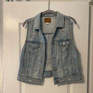 Distressed denim vest
